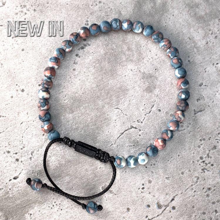 Tuscan Bead Bracelet - Our Tuscan Bead Bracelet Features Natural Stones, Waxed Cord and Brushed Black Steel Hardware. A Beautiful Addition to any Collection.